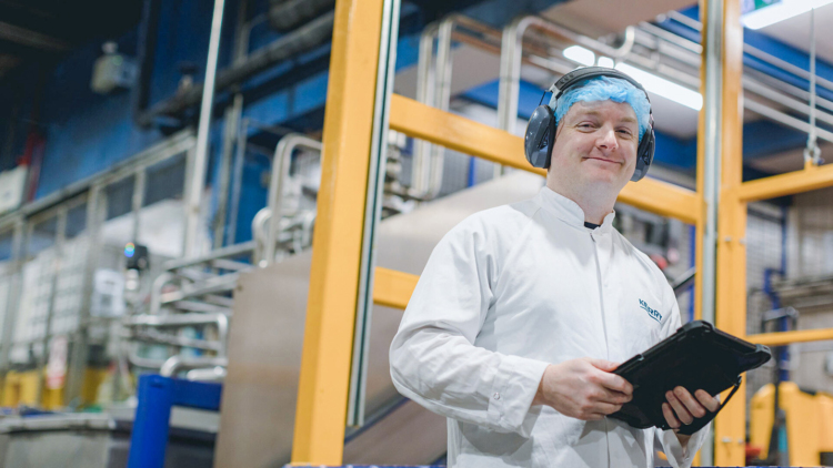 Kerry omagh facility employee wearing ppe smiling 717 retina